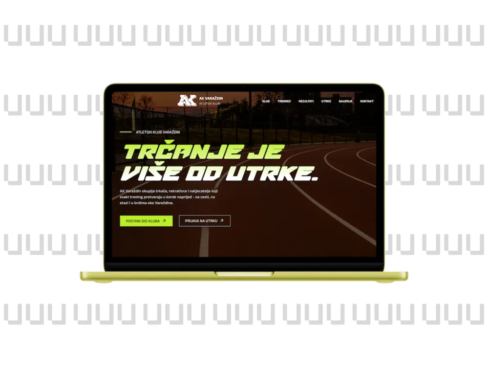 Yellow laptop displaying a webpage for AK Varaždin athletic club with a background image of an outdoor running track and text in Croatian promoting running and club membership.